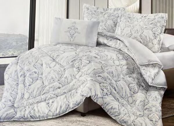 6 Piece Printed Comforter Set. Microfiber. 100 GSM. Filling 250 GSM Polyester. Oversized. Set Includes: 1 Comforter, 2 Pillow Shams and 3 Cushions.
